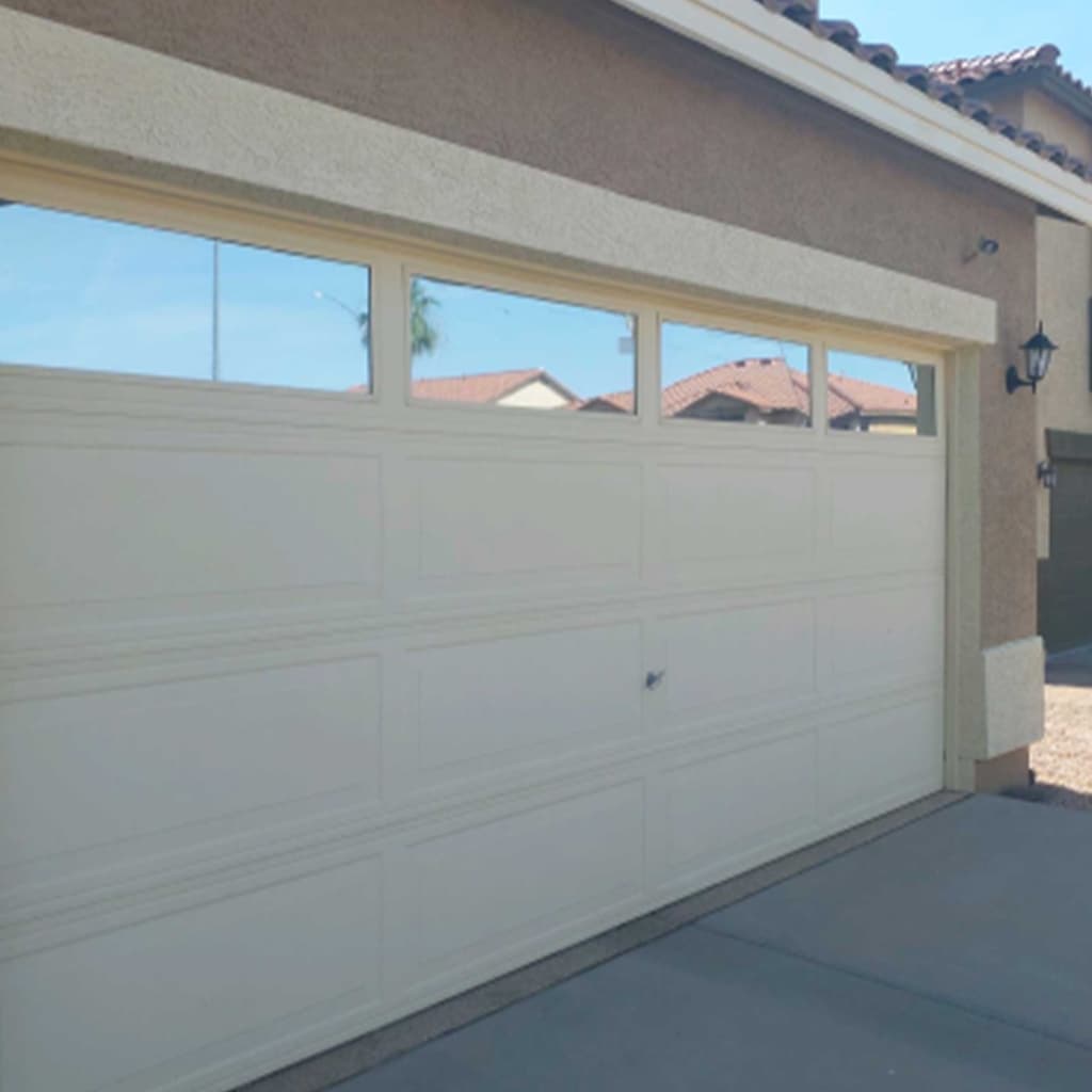 Upper garage door glass panels