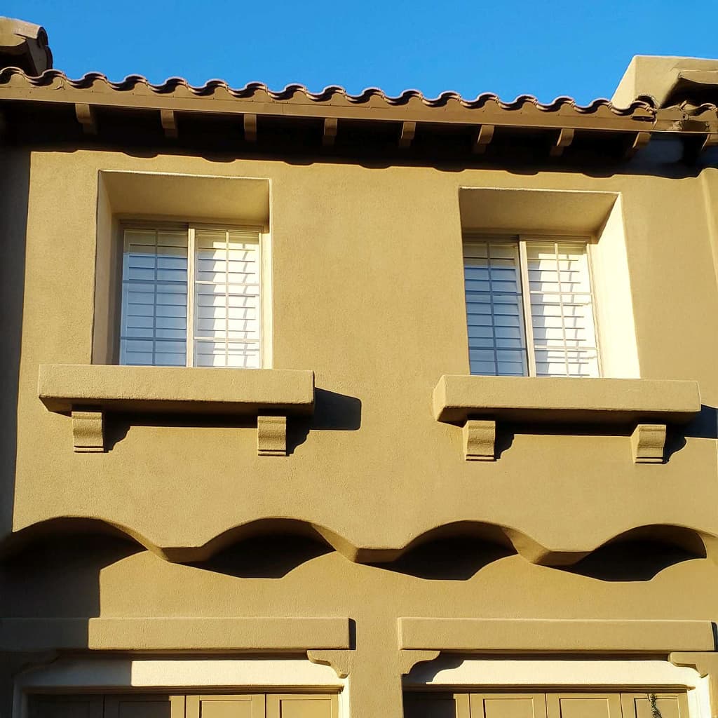 Upper-story windows with divided light detail