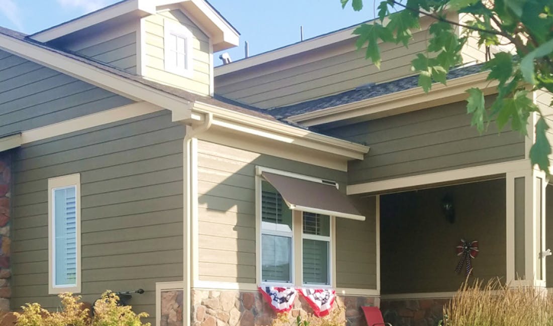 solar-powered retractable window awning install