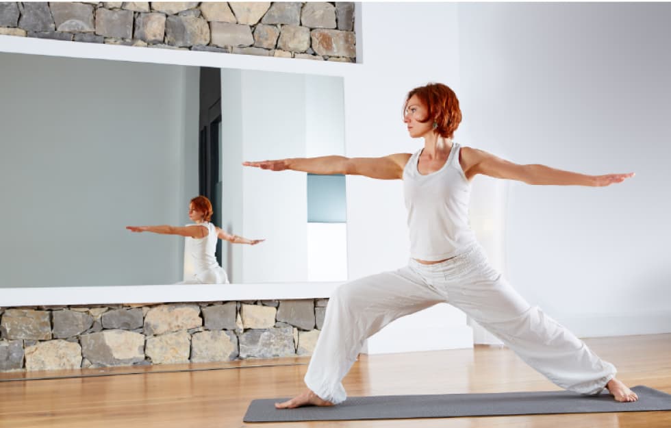 Woman practicing in front of a mirror